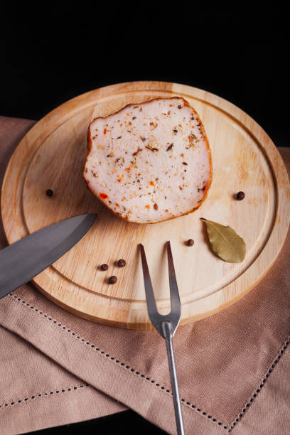 istock Meat sausage on a board with sauce 1272294612