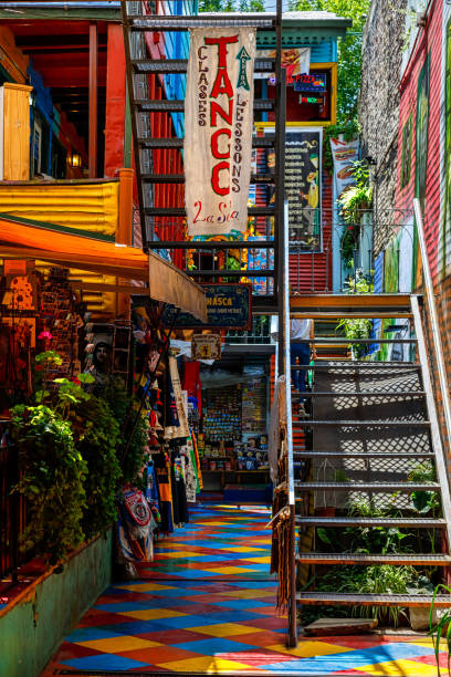 Gallery of a cultural center in Caminito, in the La Boca neighborhood, with a banner announcing tango lessons Buenos Aires, Argentina - January 24, 2020: Gallery of a cultural center in Caminito, in the La Boca neighborhood, with a banner announcing tango lessons la boca buenos aires stock pictures, royalty-free photos & images