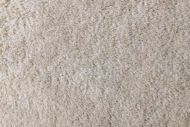 istock Macro closeup of a beige towel 1272296273