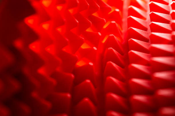 istock abstract red silicone pyramids mat close-up background with selective focus and blur 1272297487