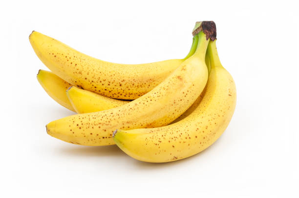 istock Spotted bananas. Ripened Cavendish bananas isolated on white with shadows. 1272299036