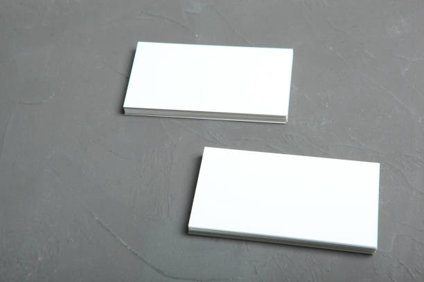 istock business cards on a colored background top view. Place to insert text 1272300153