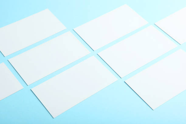 istock business cards on a colored background top view. Place to insert text 1272300449