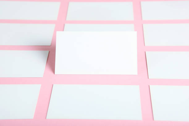 istock business cards on a colored background top view. Place to insert text 1272300536