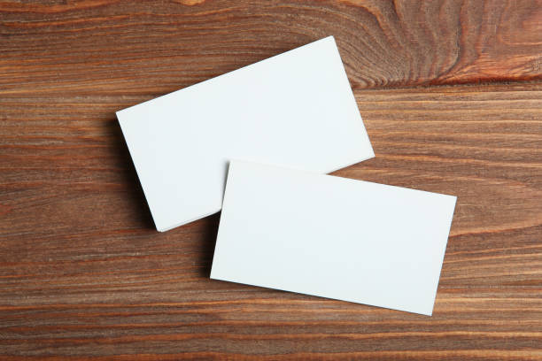 istock business cards on a colored background top view. Place to insert text 1272301497