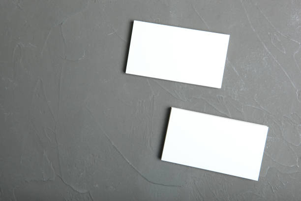 istock business cards on a colored background top view. Place to insert text 1272301498