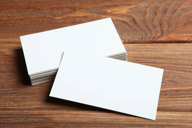 istock business cards on a colored background top view. Place to insert text 1272301527
