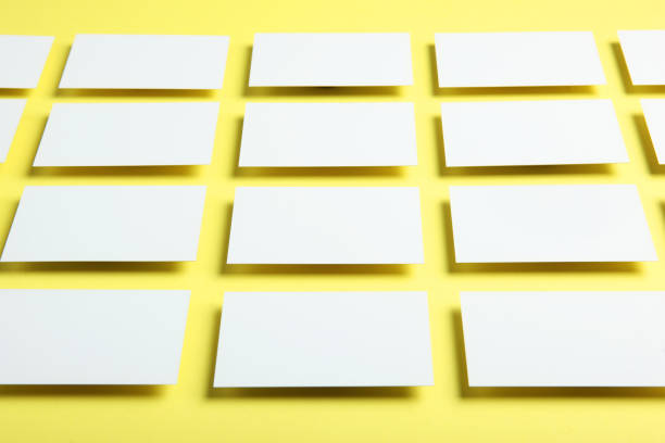 istock business cards on a colored background top view. Place to insert text 1272301610