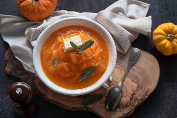 istock Homemade pumpkin cream soup with sage 1272301794