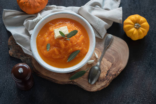 istock Homemade pumpkin cream soup with sage 1272301801
