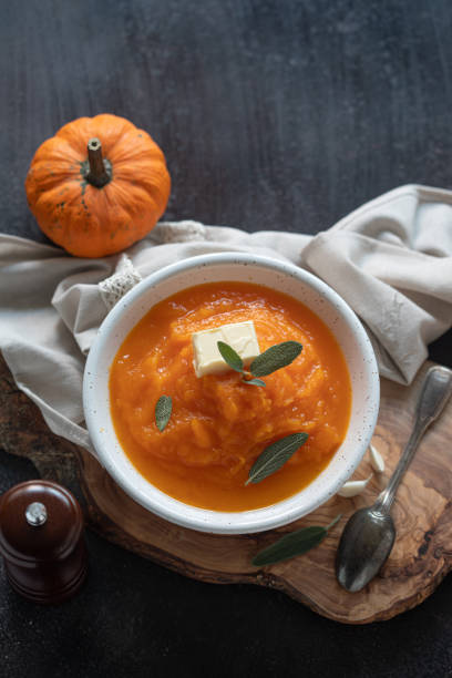 istock Homemade pumpkin cream soup with sage 1272301852