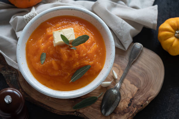 istock Homemade pumpkin cream soup with sage 1272301875