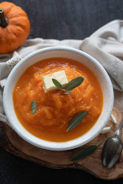 istock Homemade pumpkin cream soup with sage 1272301876