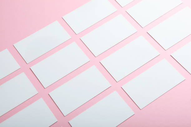 istock business cards on a colored background top view. Place to insert text 1272303848