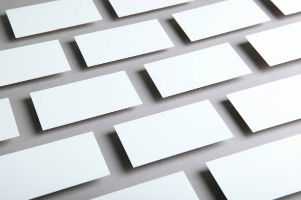 istock business cards on a colored background top view. Place to insert text 1272304247