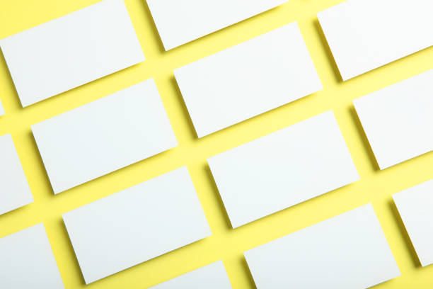 istock business cards on a colored background top view. Place to insert text 1272304386