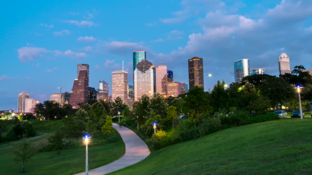 Aerial Day to Night Time Lapse of the Houston Skyline From Lighted Up Park
