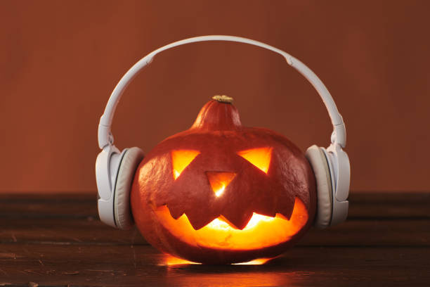istock Jack O' Lantern Pumpkin In Headphones 1272311581