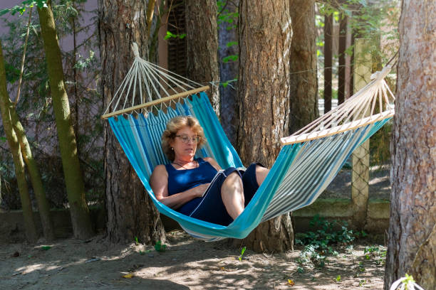 istock Senior woman enjoying in nature 1272313562