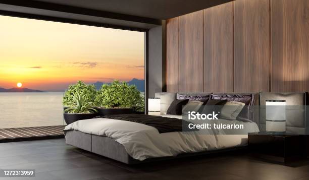 Sunset Luxurious Apartment Master Bedroom Interior With Large Terrace Stock Photo - Download Image Now