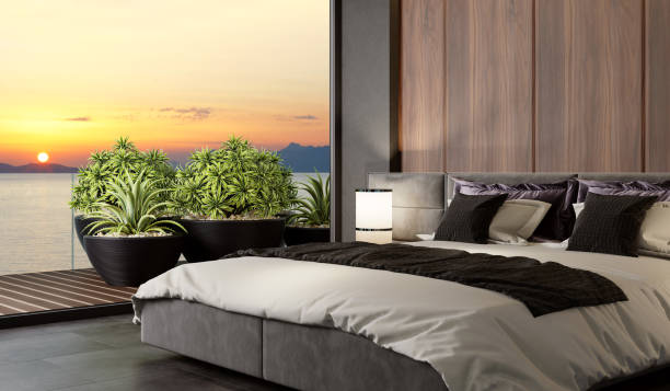 istock Sunset Luxurious apartment master bedroom interior with large terrace 1272314665