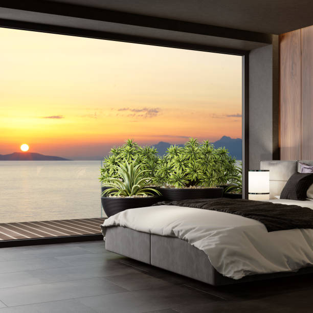 istock Sunset Luxurious apartment master bedroom interior with large terrace 1272314804