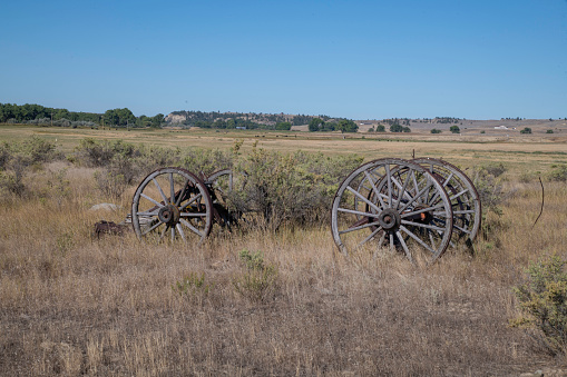 Unused old farming wagon in rural Montana USA on 150 year old ranch