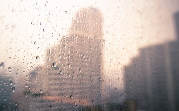 istock Raindrops and blurred Bangkok city background 1272318662