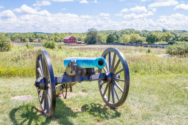 istock Green Cannon On The Battlefield 1272319608