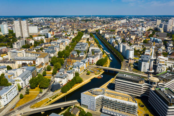 Rennes city with modern apartment buildings , Brittany region, France Panoramic view of Rennes city with modern apartment buildings , administrative center of Brittany region, France ille et vilaine stock pictures, royalty-free photos & images