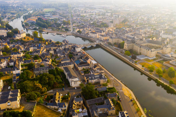 istock Panoramic view from above on the city Chateau-Gontier and Mayenne river 1272328692