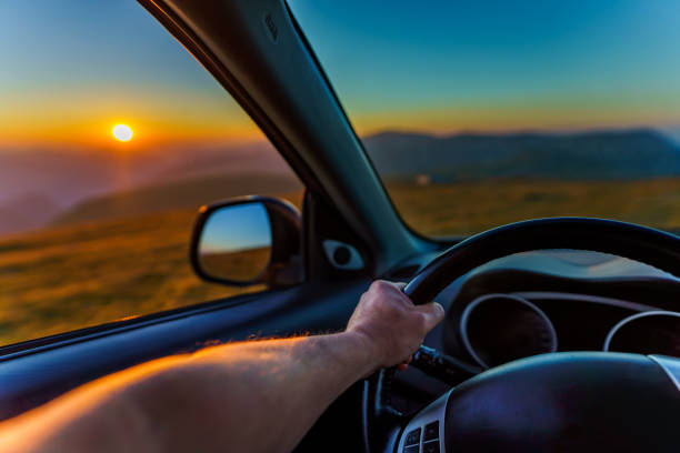 istock Off-road car in the mountains at sunrise 1272330381