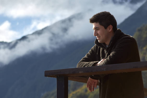 istock young man joyfully watches from above 1272330423