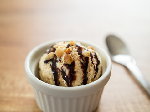 ice cream with chocolate sauce and nuts