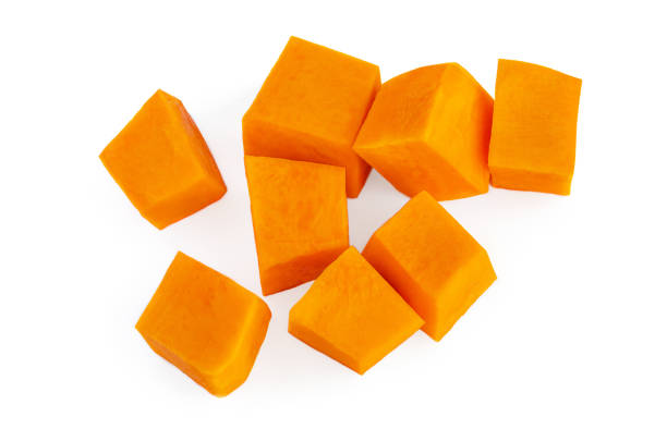 istock Pumpkin vegetable cube slice isolated on white background. Top view. Autumn Pumpkins Thanksgiving concept 1272342577