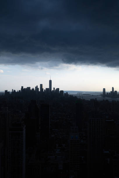 istock Dark clouds massed on the horizon of Manhattan 1272342649
