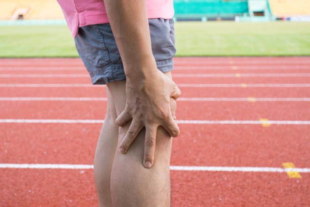 istock Tendon knee joint problems on Man leg from exercise In the stadium. 1272344436