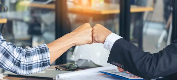 Photo of Banner template Partner Business Trust Teamwork Partnership. Industry contractor fist bump dealing mission business. Mission team meeting group of People Fist bump Hands together. Business Concept