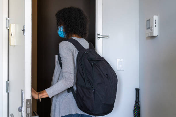 istock Student in COVID days going to college 1272350450