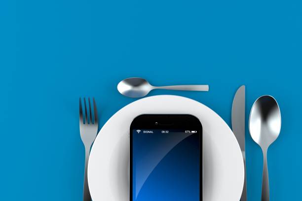 istock Meal with smartphone 1272353288