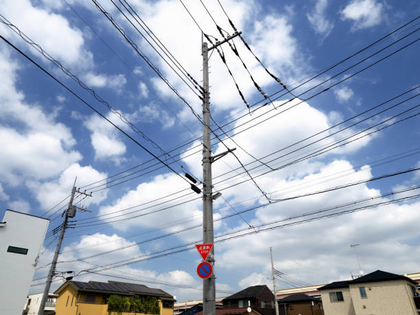 istock Electric wires and utility poles 1272356150