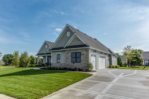 istock Driveway leading to side entry garage 1272358377