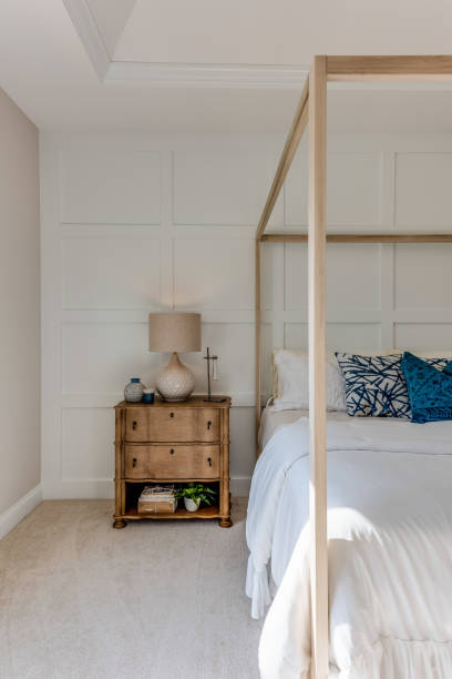 istock Gorgeous light and bright bedroom with four poster bed 1272358387