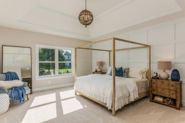 istock Gorgeous light and bright bedroom with four poster bed 1272358389