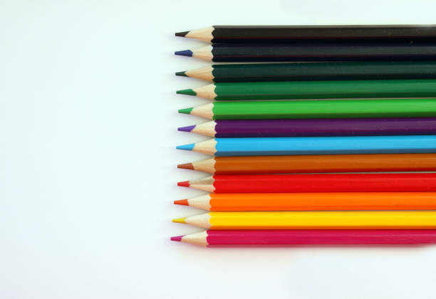 istock Colored pencils on a white background. Lots of different colored pencils. Colored pencil. Pencils are very sharp. Pencils are on the right, exactly. Close-up. Copy space. Background. Flat lay 1272359063