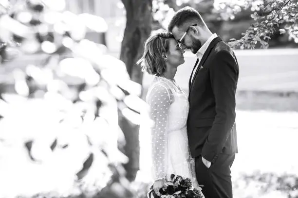 Photo of Beautiful black and white photo of bride and groom.