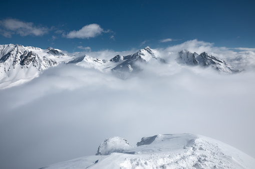 Majestic snowcapped mountains in France (Val Thorens). View from Cime Caron (3200m).