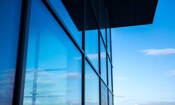 istock Glass Facade of Building and Sky Reflection 1272367755