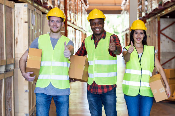 istock Diversity black and white warehouse worker portrait 1272368894