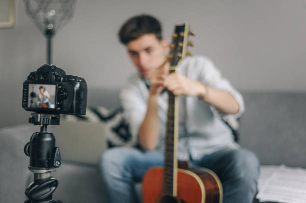 istock Guitarist Youtuber vlogging 1272371072
